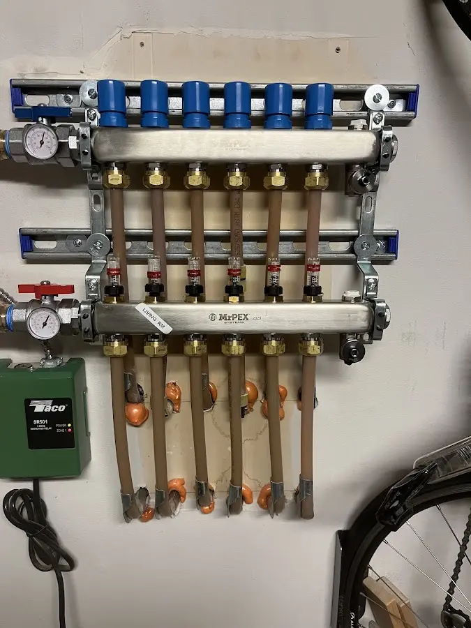 Plumber performing Water Heater Repair at a residential property in Sykesville