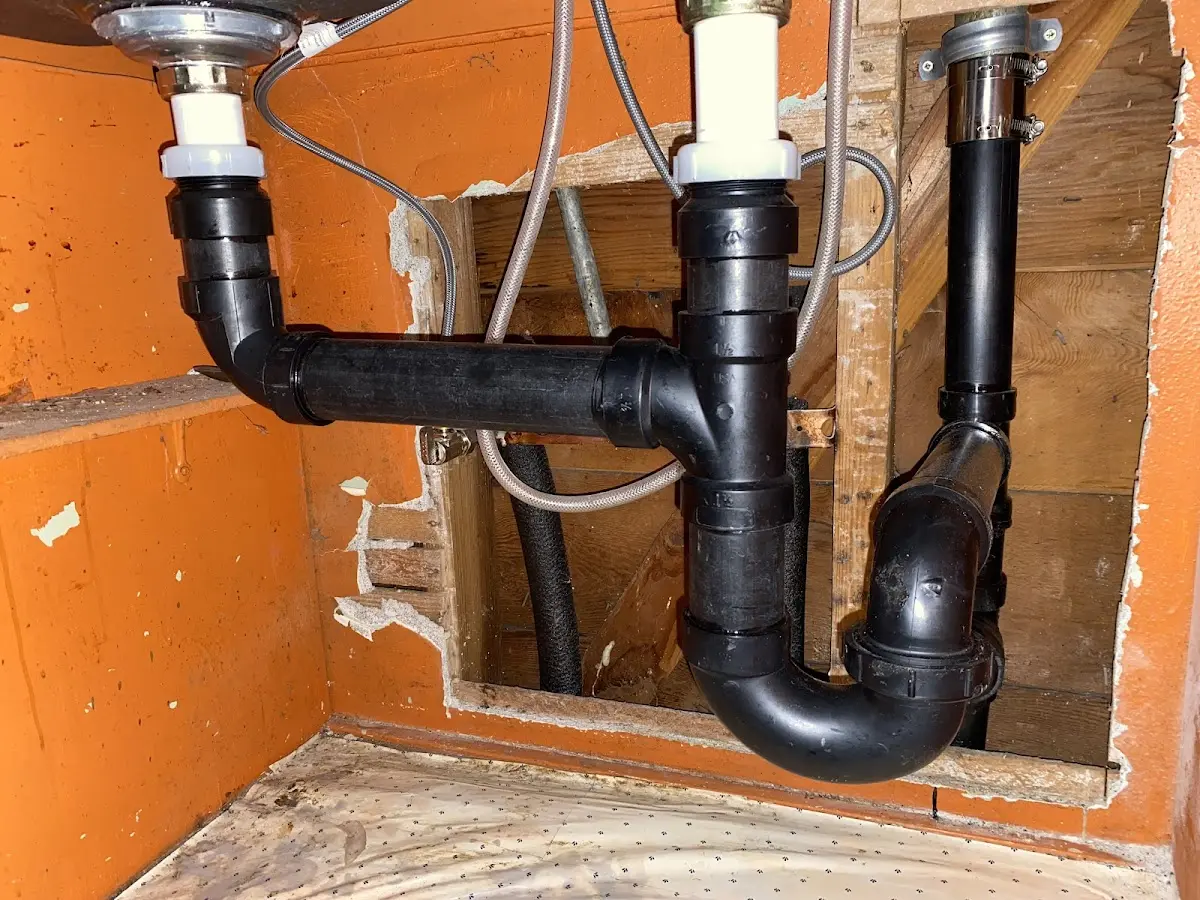 Professional Garbage Disposal Repair equipment and tools on the job in Sykesville